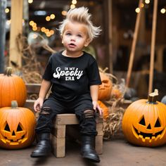 "Introducing our kid Halloween T-Shirt, a stylish and personalized piece that celebrates Halloween and Fall... With its unique design and customizability, this shirt is perfect for your little girl or boy to showcase her pride and individuality. The front of the shirt features an eye-catching print that boldly states \"In my spooky era\".  Our toddler/youth T-Shirt is not only fashionable but also comfortable to wear. Made with high-quality materials, it provides a soft and relaxed fit, perfect for everyday wear and play. For our comfort colors® tee: https://www.etsy.com/listing/1548638845/in-my-spooky-era-shirt-for-girls-purple?click_key=9a1e91cf6c6a853ed202c19fda554f6e527e8685%3A1548638845&click_sum=84908af1&ref=shop_home_active_5&pro=1&sts=1" Fall Tshirts, Halloween First Birthday, Kid Halloween, Babies Fashion, Baby Boy Halloween, Spooky Babe, Halloween Toddler, Kids Shirts Boys, Halloween And Fall