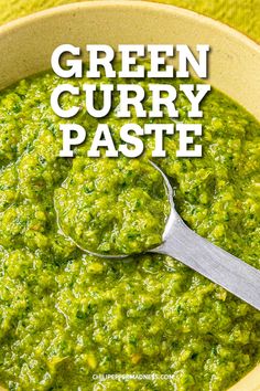 a bowl full of green curry paste with a spoon in it and the text overlay reads, green curry paste