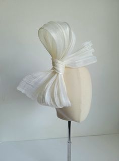 "Gorgeous fine Ivory abaca woven with shiny silk threads.  Fabric has slightly sheer and has a blousy feel with an irregular wavy weave at first appearance, perfect for bows for your hats and fascinators. Fabric width: (39 inches) Sold by the half meter (20\"x39\"). Multiple lengths purchased will arrive as one long continuous piece. Other colors available." Wavy Weave, Hats And Fascinators, Large Brim Hat, Types Of Hats, Ivory Silk, Silk Thread, Fabric Width, Hat Making, Other Colors