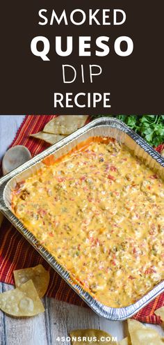 a casserole dish with cheese and tortilla chips on the side