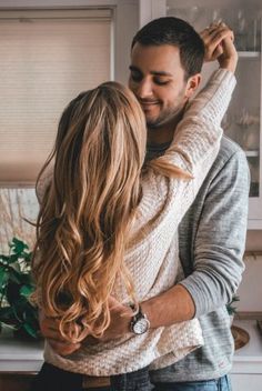 a man and woman embracing each other with the text 5 things wives need to hear from their husbands