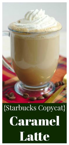 starbucks caramel latte with whipped cream in a glass mug on a colorful table cloth