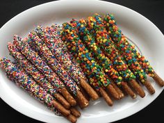 three different types of sprinkles on a white plate