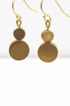 Elegant brass dangle earrings with gold fill ear hook. 1 1/4" long with widest disc: 3/8” Made in Los Angeles, CA Disc Earrings, Ear Hook, Gold Filled, Dangle Earrings, Angeles, Drop Earrings, Brass, Gold, Los Angeles