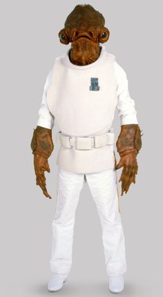 a star wars character is dressed in white and has his hands on his hips as he stands