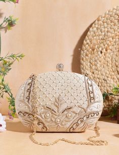 Introducing the Luxury Embroidered Oval Clutch, a stunning accessory designed to add a touch of elegance to any outfit. Perfect for brides, weddings, and special occasions, this designer clutch features intricate embroidery, a chic round shape, and an ethnic shoulder strap. It makes a thoughtful and luxurious gift for her. Description: Luxury Embroidered Oval Clutch | Bride Gift | Wedding Gift | Purses For Her | Ethnic Shoulder Strap Bag | Designer Clutch | Fashion Bags Material: Crafted from hi Luxury Clutch, Gold Clutch, Sequin Embroidery, Designer Clutch, Shoulder Strap Bag, Strap Bag, Accessories Bags Purses, Wedding Bag, Bride Gift