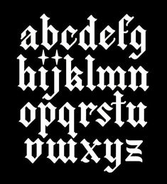 the upper and lower case of an old english font, with white letters on black background