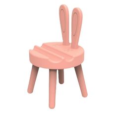 a pink plastic chair with two bunny ears on it's back legs and feet