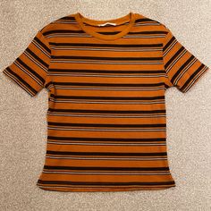 This Ribbed And Striped Medium Zara Tee Is Nwot. It’s In Perfect Condition But The Inside Tag Has Been Removed. Really Comfortable Material That Can Be Dressed Casually Or Up Because Of The Nice Ribbed Quality. Though Size Medium, It Is Meant To Have A Snug Fit. It’s A Beautiful Deep Ochre, Almost Orange. Striped Tops For Women, Autumn Fits, Dream Clothes, Orange White, Zara Tops, Orange Yellow, Striped Shirt, Black Tee, Snug Fit