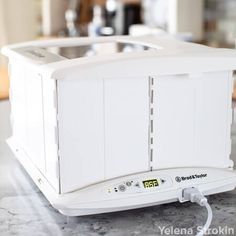 an electronic device sitting on top of a counter