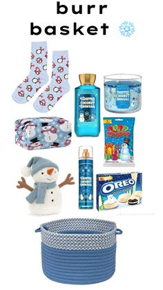 the contents of a baby's gift basket including socks, diapers and other items