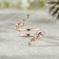 two rose gold rings with diamonds on them