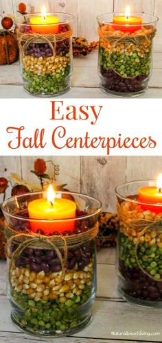 three glass vases filled with different types of food and candles on top of a wooden table