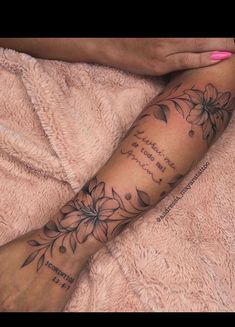 a woman's foot with flowers on it and the words, i love you