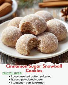 cinnamon sugar snowball cookies on a white plate