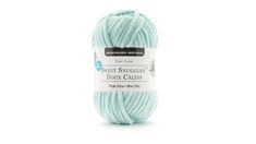 the yarn ball is light blue and has a white label that says sweet snuggies dozer calms