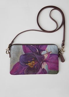 Purple Colorado Columbine. Crafted from genuine leather and printed canvas, the VIDA Statement Clutch is a versatile standout accessory for any occasion. Audacity Press original.