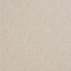 a beige wallpaper with white swirls on it