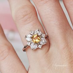 Beautiful Nature Inspired Citrine Ring ►Made of sterling silver, rhodium plated (925) ►Accented with simulated diamonds (CZ) Center Stone: Citrine Gemstone creation: Natural Shape: Cushion Gem Size: 5.0 x 5.0 mm. Total Carat Weight: 0.71 (approx.) Hardness: 7 (Mohs scale) ✓ 100% Nickel-Free ✓ Hypoallergenic ✓ Comfort Fit ✓ Free Ring Box ✓ Free USA Shipping ✓ Ready to ship next business day Silver Engagement Ring, Mohs Scale, Yellow Jewelry, Moonstone Engagement Ring, Sterling Silver Engagement Rings, Citrine Ring, Vermeil Jewelry, November Birthstone, Natural Citrine