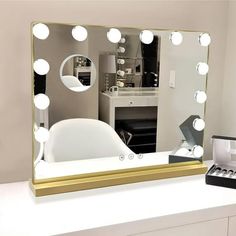 Smart Touch Control: This vanity makeup mirror surrounded by 9 dimmable LED bulbs. Softly click the button "M" to change the colour temperature(cool light/neutral light/warm light). Long press the button "P" to adjust the brightness levels from low to high. Our mirror light can meet your different personal makeup requirements. Adjustable Brightness: This vanity mirror with lights has Brightness memory function. Even if the light is turned off and on, it can easily remember the brightness you use Gold Vanity Mirror With Lights, Boujee Aesthetic Room Decor, Vanity Mirror Desk, Gold Vanity Mirror, Bulb Mirror, Mirror For Bedroom, Vanity Makeup Mirror, Mirrors For Makeup, Hollywood Vanity