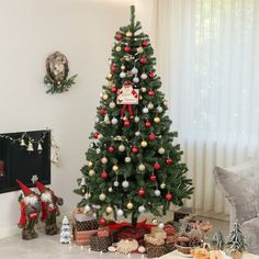 a decorated christmas tree in a living room