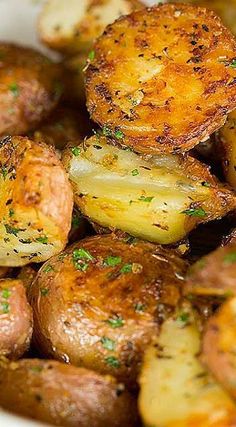 closeup of cooked potatoes with herbs and seasoning