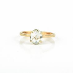 An ideal gift for your loved ones, This beautiful ring is the perfect proposal wedding ring. Add an extra sparkle to your look with this statement piece. > Gemstone - Genuine Green Amethyst > Materials - Solid 14K Yellow gold> Gemstone Weight - 1.070 ct> Gross Weight - 2.90 GramsGreen Amethyst or Prasiolite is a light green-colored, transparent, semi-precious gemstone of Quartz mineral family. It is considered highly effective healing gemstone and is also worn to gain spiritual seren Oval Amethyst Ring, Green Emerald Ring, Green Amethyst Ring, Amethyst Gold, Gold Statement Ring, Natural Gemstone Ring, Etsy Gold Ring, Charm Rings, 14k Gold Ring