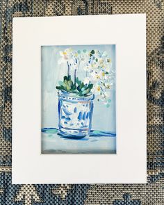 a painting of white flowers in a blue vase