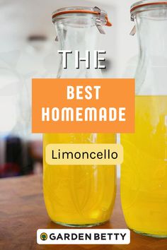 the best homemade lemoncello is in two glass jars on a table with text overlay