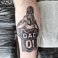 a black and white tattoo of a football player with the number 10 on his jersey