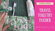 a person holding a toothbrush in front of a floral bag with the words travel toiletry holder on it