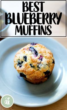 blueberry muffins on a plate with the words best blueberry muffins