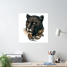 a drawing of a leopard's head on a white wall above a wooden desk