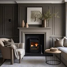 a living room filled with furniture and a fire place next to a wall mounted fireplace