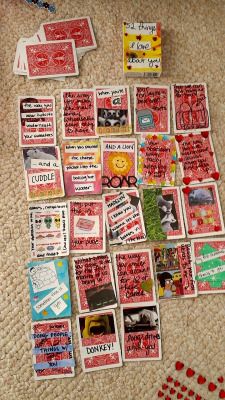 a pile of cards that are laying on the floor next to each other with words and pictures all over them