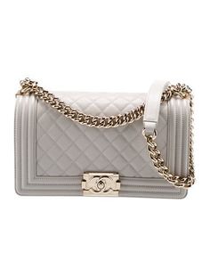 Chanel Shoulder BagBy Karl LagerfeldGreyInterlocking CC Logo, Caviar Leather & Chain-Link AccentGold-Tone HardwareChain-Link Handle & Chain-Link Shoulder StrapGrosgrain Lining & Single Interior PocketPush-Lock Closure at Front Rich Daughter, Tas Lv, Gold Bags, Boy Chanel, Handbags Chanel, Chanel Chevron, Chanel Store, Handbag Outfit, Chanel Official