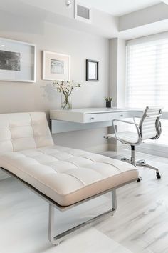 a white chair sitting in front of a desk