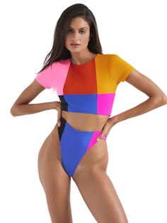 The Claudia Top is a fashionable color block crop top swimwear, perfect for those seeking a trendy and playful beach or pool outfit with a touch of modern style. The Stella Bottom is a fashionable choice with a color block design, offering both cheeky and full coverage options to suit your style. Its high waist and high leg cut create a flattering look that's perfect for soaking up the sun in style.
 Select: Top, Bottom; Size: XS, S, M, L, XL; Fit: -, Cheeky, Full Multicolor Cropped Beachwear Crop Top, Trendy Stretch Color Block Swimwear, Color Block Stretch Swimwear For Vacation, Bold Multicolor Swimwear For The Beach, Bold Multicolor Swimwear For Beach, Vacation Color Block Stretch Swimwear, Two-tone Color Block Fitted Swimwear, Fitted Crop Top With Contrast Color For Summer, Fitted Color Block Cropped Top