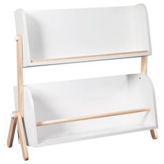 a white book shelf with two wooden legs