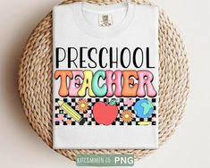 a white t - shirt with the words preschool teacher on it