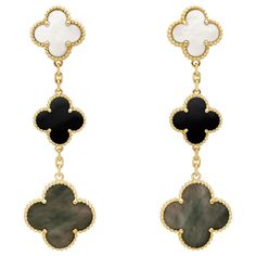 Magic Alhambra earrings, 3 motifs, 18K yellow gold, white and gray mother-of-pearl, onyx. REFVCARD79000 Original Price at store 9.750€ Mother-of-pearl: 4 stones Onyx: 2 stones Clip back with detachable stem in 18K yellow gold, option to remove or reposition the stem in store Jacques — the nephew of Estelle Arpels, who founded Van Cleef & Arpels with her husband, Alfred, in 1906 — liked to say, "To be lucky, you must believe in luck.” This mantra is embodied in the four-leaf clover motif, which c Alhambra Earrings, Yellow Gold Drop Earrings, Van Cleef & Arpels, Van Cleef And Arpels, White Coral, Van Cleef Arpels, Blue Agate, Van Cleef, Modern Earrings