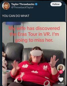 a woman in a red shirt is wearing a blindfolded headband while sitting on a couch