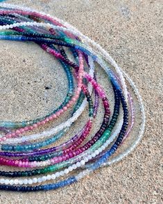 jemma sands on Instagram: “drenched in color 🌈 ⠀⠀⠀⠀⠀⠀⠀⠀⠀ gorgeous eternity beaded necklaces in all the healing gemstones 💫 xxj” Healing Gemstones, Beaded Necklaces, Gemstone Healing