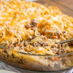 a casserole dish filled with meat and cheese