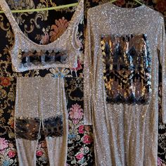 This Is Gorgeous! It’s Ideal For Tiny Busted Ladies Xs-Medium With Stretchy Sequin Fabric With A Bit Of Stretch But Best For Busts 34 And Under. There Is A Matching Sequin Lightweight Cardigan And All 3 Pieces I Customed To Match With Vintage Fabrics. It’s Truly Beautiful And Like All Of My Designs, A One Of A Kind Creation Using What We Already Have On This Planet Rather Than Contribute To Global Warming For Our Designer Fix. Free Gifts With Purchase And Discounts On Bundles! Follow My Designs, Sales And Shows On Ig: Farrahnaykaashline. Glamorous Embellished Silver Set, Glamorous Silver Sets For Festive Season, Embellished Silver Party Sets, Glamorous Silver Festive Sets, Glamorous Festive Silver Set, Glamorous Sets For Festive Night Out, Glamorous Silver Fitted Sets, Glamorous Festive Sets For Night Out, Glamorous Festive Night Out Sets