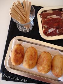 some food is sitting on a tray and ready to be eaten with chopsticks