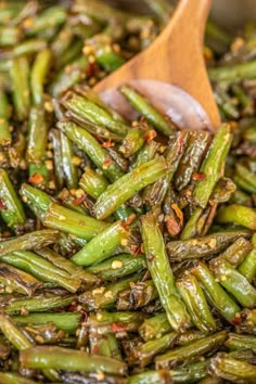 asparagus stir fry with sesame seeds in a pan