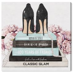 a pair of high heeled shoes sitting on top of books with pearls around them