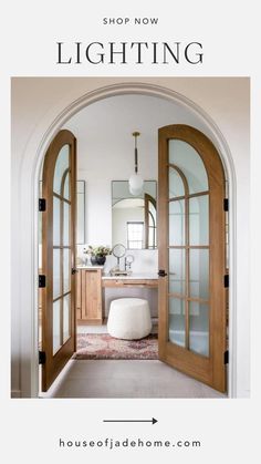 an open door leading to a bathroom with the words shop now lighting above it and below