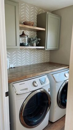 a washer and dryer in a small room